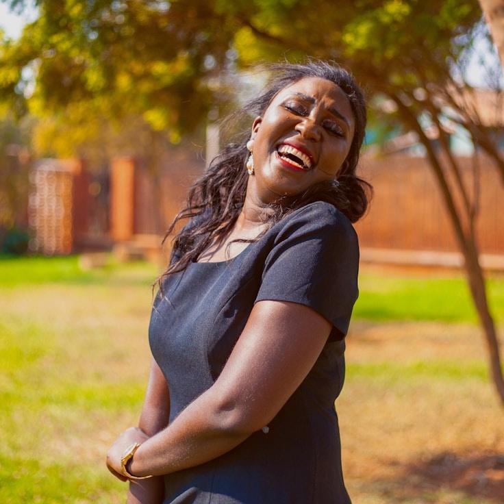 Kaveri Mehta, Lead Design Curator at SkyFieldScroll, reviewing corporate floral arrangements