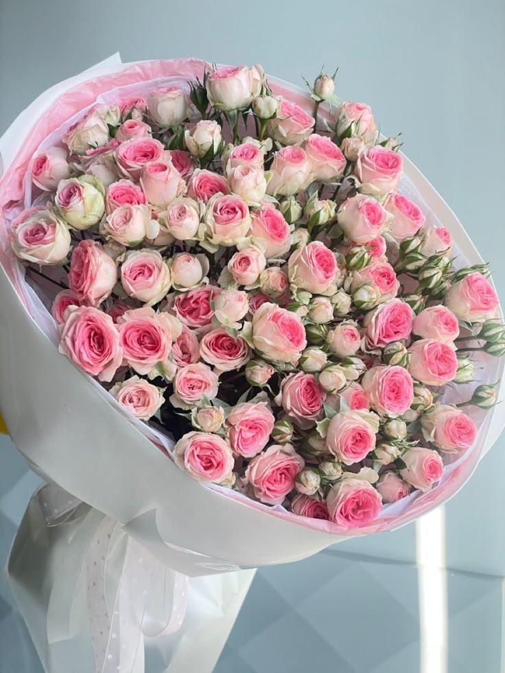 Corporate meeting room with carefully timed floral arrangements that maintain elegance throughout business hours